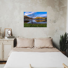 Load image into Gallery viewer, &quot;Ephemeral Embrace 24&quot; x 36&quot; - Tranquility in a rustic beige bedroom, bringing the ephemeral beauty of Porcupine Reservoir to your personal retreat.&quot;

