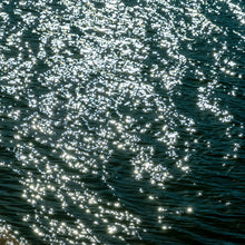 Load image into Gallery viewer, Photography by Ana Sosa  of turquoise water with bright sparkles, and waves.