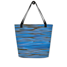 Load image into Gallery viewer, Large tote bag with all-over print and pocket, printed on the front with an image of blue reflections in the water. Closeup of the other side of the bag