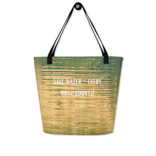 Load image into Gallery viewer, Back side Tote bag is an elegant and environmentally friendly choice. Designed in yellow and green colors, it is striking and unique. With every purchase you are helping to save water and protect the planet.