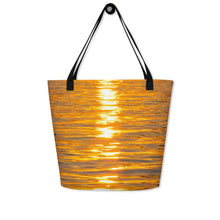 Load image into Gallery viewer, A Photo of orange reflection all over print on a large tote bag. Close up hanging with black strap