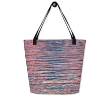 Load image into Gallery viewer, Tote bag with ethereal pink tones of sunset reflections, versatile accessory that can be used to go to the beach