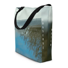 Load image into Gallery viewer, lateral side view of a beautiful tote bag features a unique design that reflects the beauty of winter and the importance of conserving water