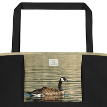 Load image into Gallery viewer, Interior view of tote bag with its respective inner bag printed with a duck swimming in the reflection of the green water.