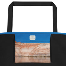 Load image into Gallery viewer, A tote bag, seen from the inside, showing details. Fully printed inner bag, blue sky and rock formations.