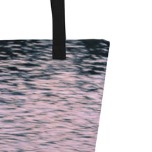 Load image into Gallery viewer, a close-up of tote bag printed with pink tones of sunset reflections, print details and cotton bundles