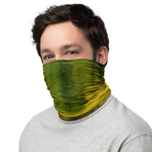 Load image into Gallery viewer, A male model wearing a versatile neck gaiter that he wears to cover his face, left side view.