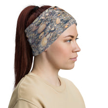 Load image into Gallery viewer, Neck Gaiter used as a band, printed with an image of beautifully colored underwater rocks, modeled on blonde hair, right size