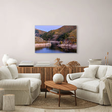 Load image into Gallery viewer, A limited edition 24"x36" photograph, 'Autumn Bushes and Pine Tree in Causey Reservoir', beautiful autumn tones where pine trees grace the landscape image. Displayed on a beige wall in a living room.