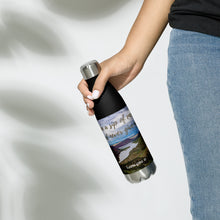Load image into Gallery viewer, Stainless steel water bottle black 17 oz. On hand, contrast of colors to compare. Front side view with Flaming Gorge Reservoir and 'take a sip of energy and never give-up' printed.