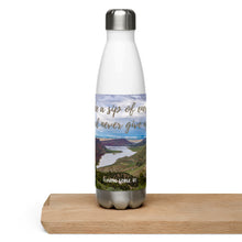 Load image into Gallery viewer, Stainless steel water bottle white 17 oz. On shelve, front side view with Flaming Gorge Reservoir and 'take a sip of energy and never give-up' printed.