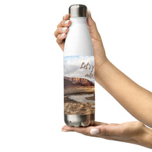 Load image into Gallery viewer, Stainless steel water bottle white 17 oz. On hand, right side view with Colorado River and Let's go to the extra mile together printed.