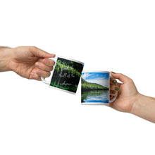 Load image into Gallery viewer, White 11-oz glossy mug with Fish Lake Image, handle on hand with front view.