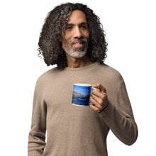 Load image into Gallery viewer, A man with a white glossy 11 oz mug with Pineview Reservoir image, handle on right.