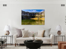 Load image into Gallery viewer, "'Exploration Essence' 40" x 60" - Adorning a beige wall in a living room with creamy, orange, black, and green furniture, creating a harmonious and adventurous ambiance."