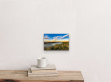 Load image into Gallery viewer, •	" Hypothetical Meaning 8" x 12" - A cozy corner with books and a mug, highlighting the charm of this smaller piece."