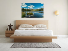 Load image into Gallery viewer, 'Oasis of Crystalline Water' - 40"x60" in a serene bedroom with wooden furniture and a modern floor lamp.