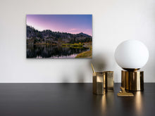 Load image into Gallery viewer, "'Rose Reflection' 16" x 24" - Enhance a white wall, above an elegant gray desk adorned with golden pencil holders and a white and gold base globe lamp."