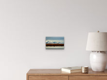 Load image into Gallery viewer, 'Stillness - Limited Edition Fine Art Print' - 8"x12" in the same setting, size comparison with books on the table.