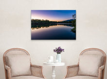 Load image into Gallery viewer, •	" Sun's Rays Kiss 24" x 36" - Adorning an antique living room with cream walls, wooden furniture, and a mix of pink cushions, creating a serene living atmosphere."