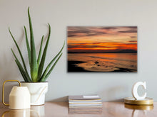 Load image into Gallery viewer, •	"‘Twilight Orange’ 16" x 24" - Gracing a white wall, complemented by wooden furniture and a potted plant, creating a serene and sophisticated ambiance."