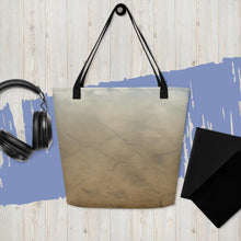 Load image into Gallery viewer, A modern tote bag, accompanied by a pair of headphones and a pair of jeans. printed in terracotta colors.

