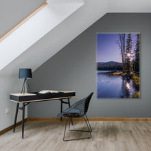 Load image into Gallery viewer, A 60&quot;x40&quot;  vertical limited edition, titled &#39;A Ray of Light Through the Pine Tree&#39;, a beautiful image with twilight colors displayed on a gray wall next to black reading desk
