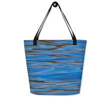 Load image into Gallery viewer, Large tote bag with all-over print and pocket, printed on the front with an image of blue reflections in the water. Closeup of the other side of the bag
