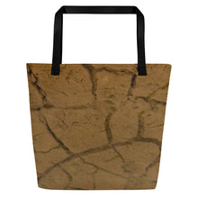 Load image into Gallery viewer, A modern beach bag, printed in terracotta colors, seen from back side, with black handles.
