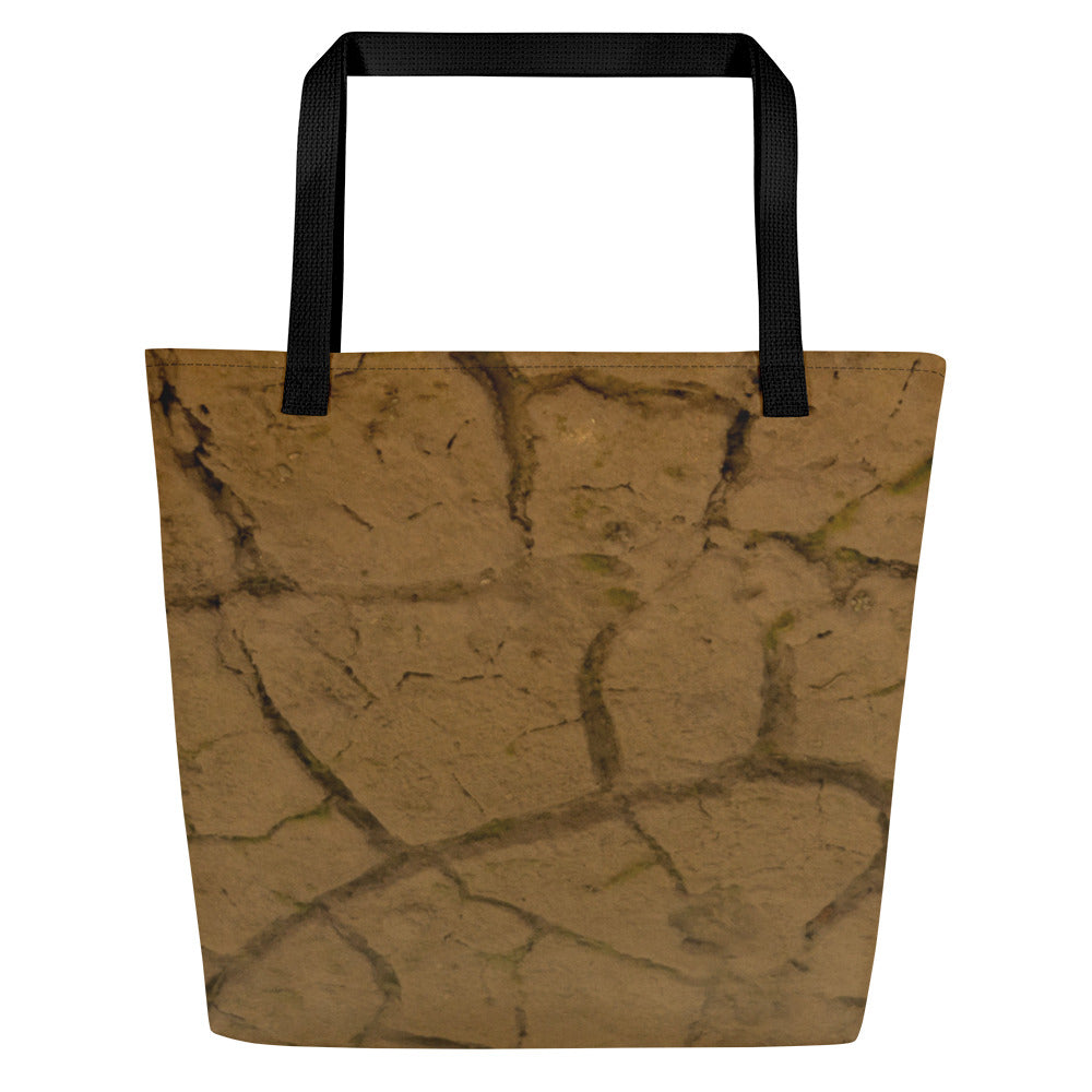 A modern beach bag, printed in terracotta colors, seen from back side, with black handles.