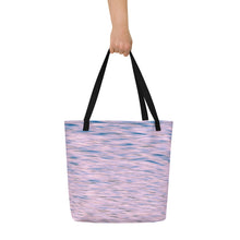 Load image into Gallery viewer, A tote bag printed with pink tones of sunset reflections, black beams, carried by one hand, back side

