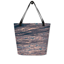 Load image into Gallery viewer, Tote bag with ethereal pink tones of sunset reflections, showing the other side, versatile accessory that can be used to go to the beach
