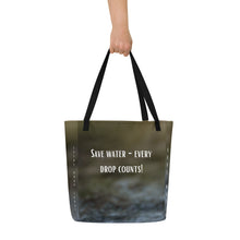 Load image into Gallery viewer, Beautiful eco-friendly tote bag with the legend Save Water each drop Count, rear view. Made with a beautiful print of a mini waterfall, modern and functional design, perfect for daily use and helps save the environment.
