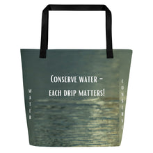 Load image into Gallery viewer, A  tote bag features a message &quot;Conserve Water Each Drip Matters&quot; written on it, making for a stunning reflection. 
