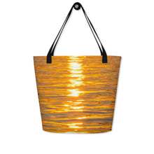 Load image into Gallery viewer, A Photo of orange reflection all over print on a large tote bag. Close up hanging with black strap

