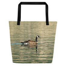 Load image into Gallery viewer, Tote bag all over print with a duck swiming in green water reflection
