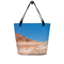 Load image into Gallery viewer, A modern tote bag, seen from one side. Printed completely, blue sky and rock formations.
