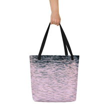 Load image into Gallery viewer, A tote bag printed with pink tones of sunset reflections. Versatile with black highlights. A modern beach bag.

