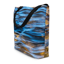 Load image into Gallery viewer, A fully printed tote bag, side view of the piece, black stripes, showing details.
