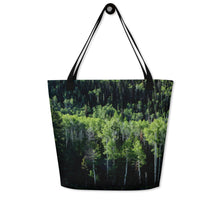 Load image into Gallery viewer, Tote bag full print with a pando forest landscape, hanging on the wall
