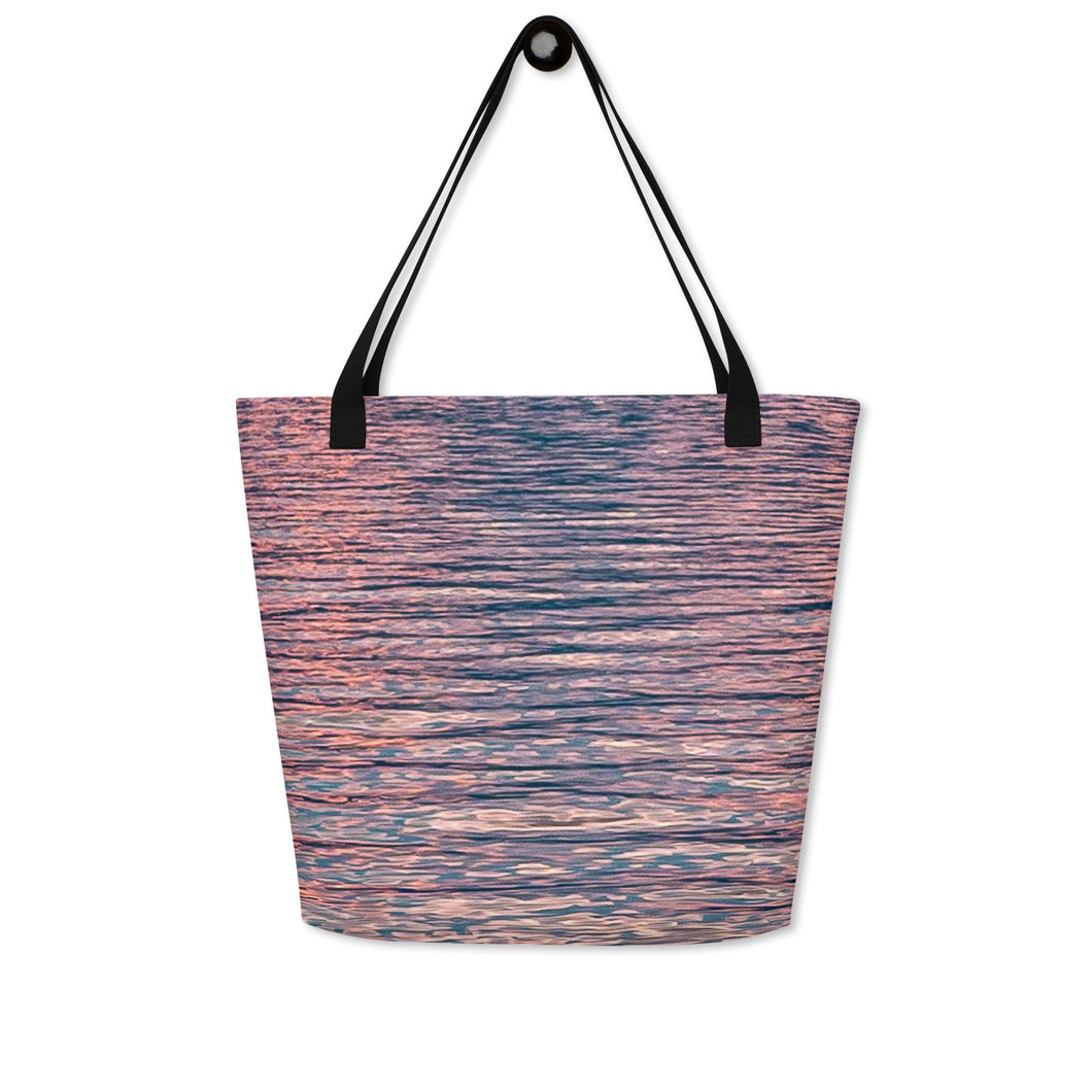 Tote bag with ethereal pink tones of sunset reflections, versatile accessory that can be used to go to the beach