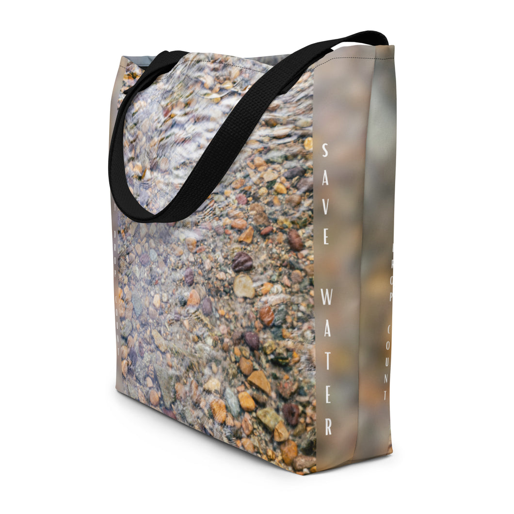 The tote bag features a stunning underwater rock print and the message 