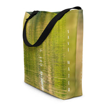 Load image into Gallery viewer, Tote bag is an elegant and environmentally friendly choice. Designed in yellow and green colors, it is striking and unique. With every purchase you are helping to save water and protect the planet.
