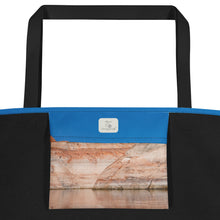 Load image into Gallery viewer, A tote bag, seen from the inside, showing details. Fully printed inner bag, blue sky and rock formations.
