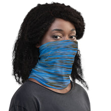 Load image into Gallery viewer, A neck gaiter on the right side, modeled like a face mask in vibrant blue and green colors.
