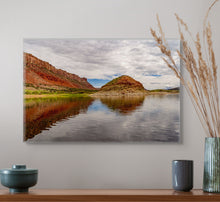 Load image into Gallery viewer, A cloudy sky mirrors on the calm waters of Flaming Gorge, showcasing a myriad of reflected tones. Print size 16x24
