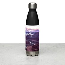 Load image into Gallery viewer, Stainless steel water bottle black 17 oz. On shelf, left side, a colorful Dead Horse Point image and &#39;Taking a sip refreshes and conquer apathy&#39; printed.
