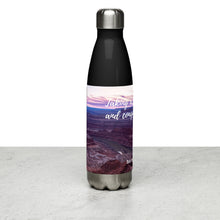 Load image into Gallery viewer, Stainless steel water bottle black 17 oz. On shelf, right side, a colorful Dead Horse Point image and &#39;Taking a sip refreshes and conquer apathy&#39; printed.
