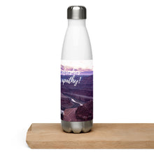 Load image into Gallery viewer, Stainless steel water bottle white 17 oz. On shelf, left side, a colorful Dead Horse Point image and &#39;Taking a sip refreshes and conquer apathy&#39; printed.
