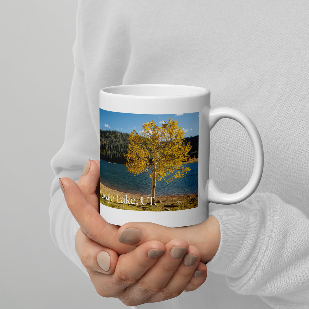 White 11-oz glossy mug with Navajo Lake image, handle on right.